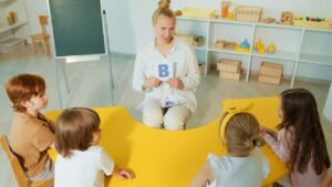 A teacher teaching the alphabet 