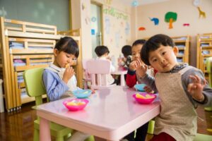 Kids eating their snacks at the nursery school