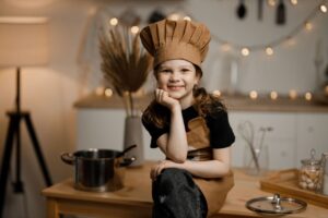 Little girl dressed as a Chef 