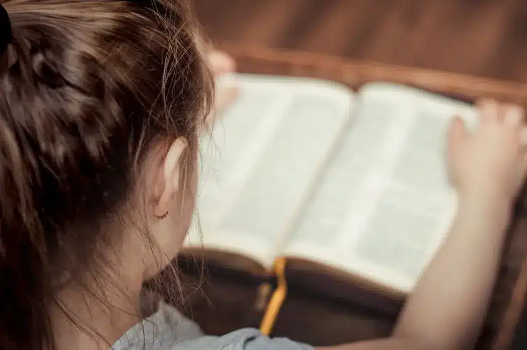 Kid Reading a Bible