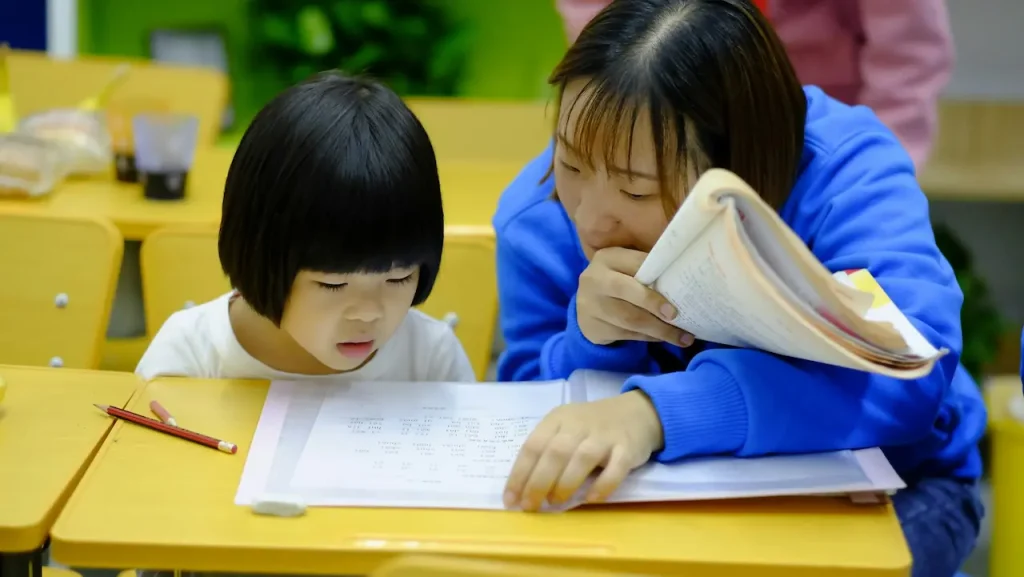 A Young Teacher Helps a Child Learn to Read 