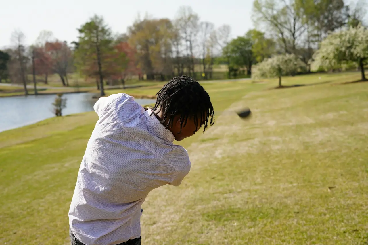 Young Teen Playing Golf